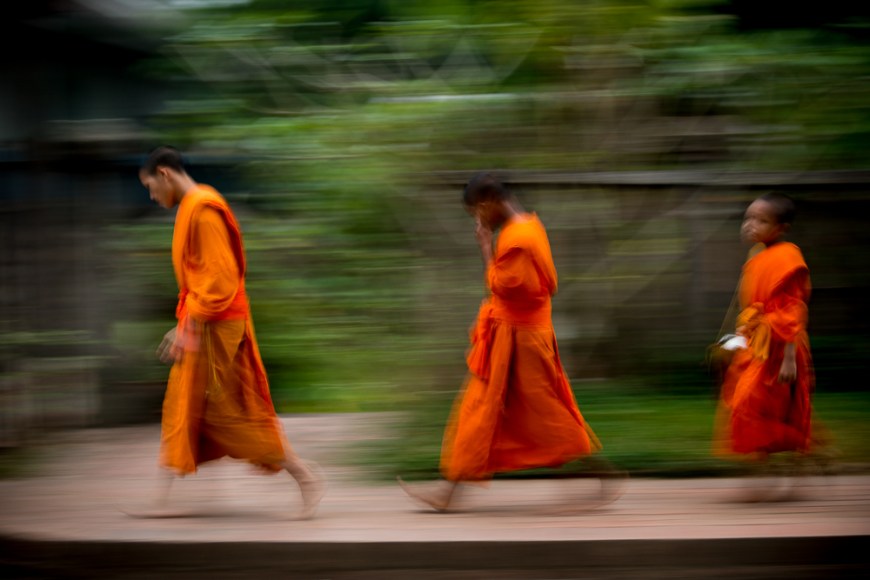 Buddhist Monks during Alms giving ceremony 'Tak Bat', Luang Prabang, Laos, Indochina, Asia
