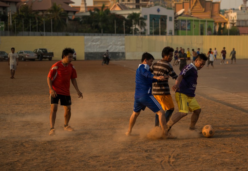 Soccer game, Olympic Stadium at dusk, Phnom Penh, Cambodia, Indochina, Asia