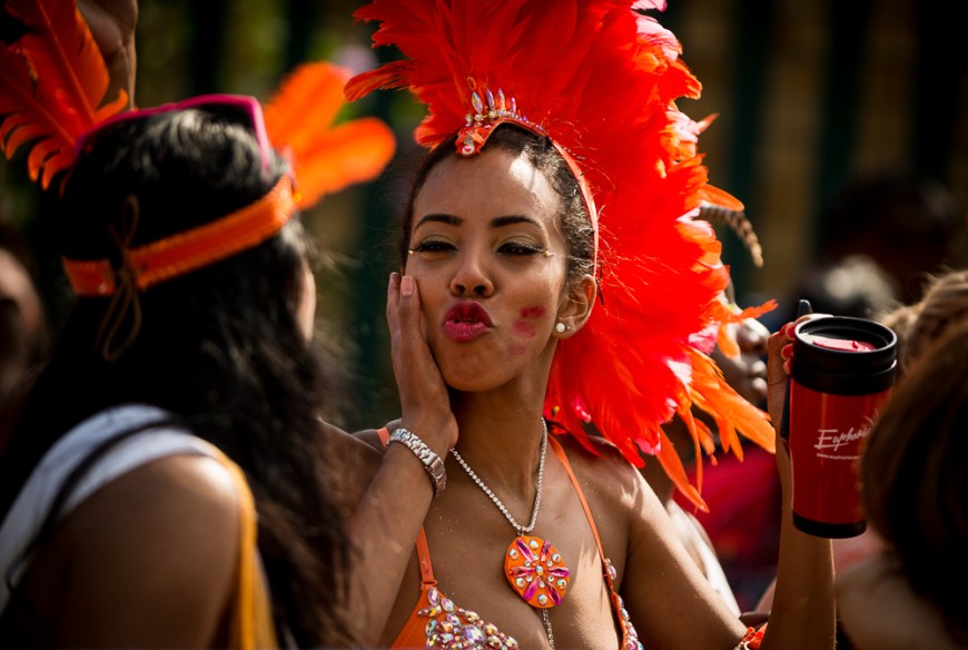 People enjoying The Notting Hill Carnival 2013, Ladbroke Grove, West London, England