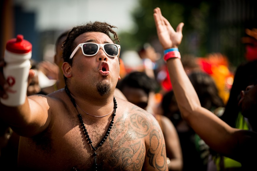 People enjoying The Notting Hill Carnival 2013, Ladbroke Grove, West London, England