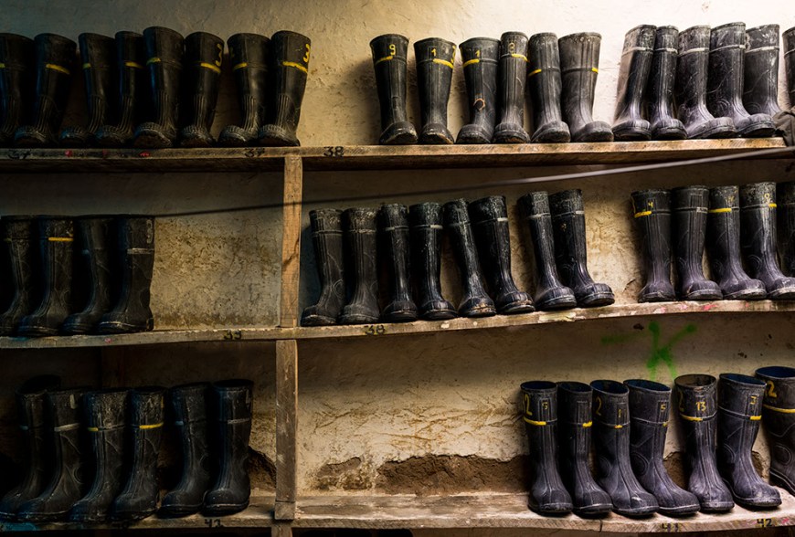 Boots ready for tourists visiting the Cerro Rico mines, Potosi, Southern Altiplano, Bolivia