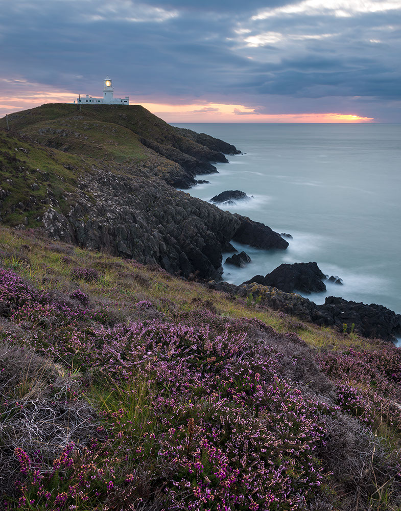 Strumble Head Lighthouse at dusk, Pembrokeshire Coast National Park, Wales, UK