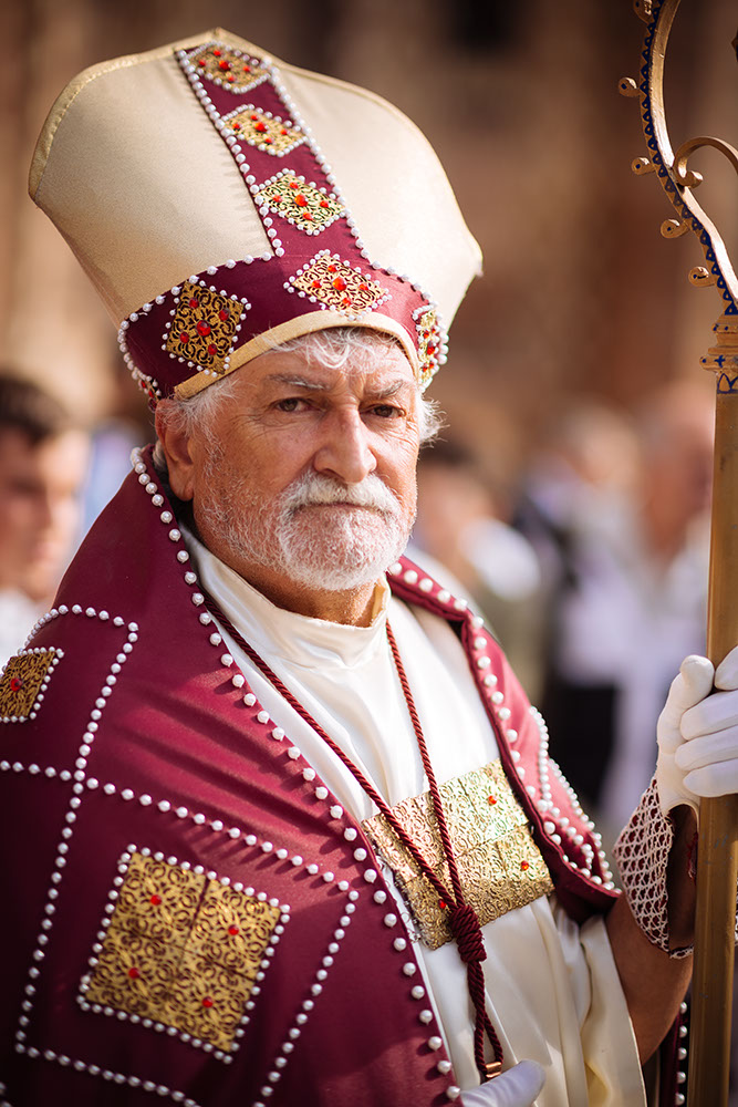 Portrait of man in traditional medieval costume ahead of the Palio di Asti