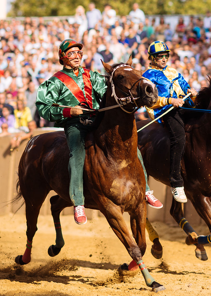 Jockey's jostle for position for the start of the Palio Di Asti on September 21, 2014 in Asti, Italy