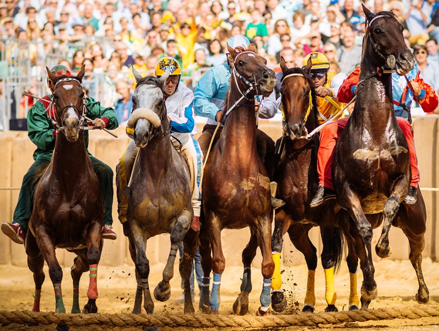 Jockeys jostle for position for the start of the Palio Di Asti on September 21, 2014 in Asti, Italy