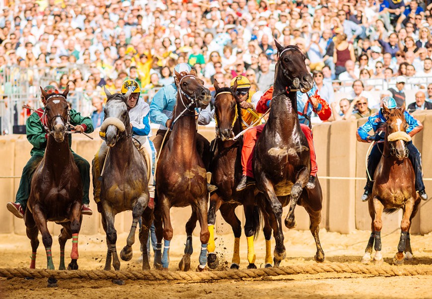 Jockeys jostle for position for the start of the Palio Di Asti on September 21, 2014 in Asti, Italy