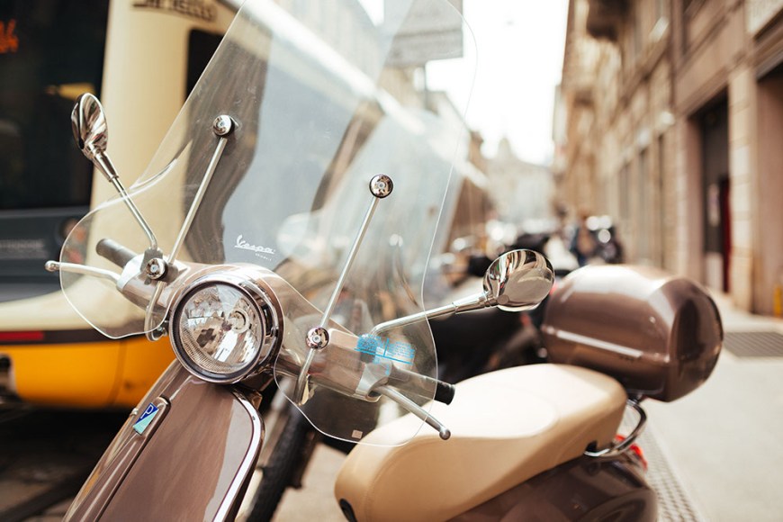 Parked 'Vespa' moped, Milan, Lombardy, Italy