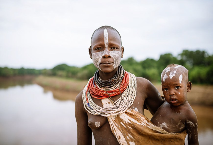 Portrait of Kore with baby, Kara Tribe, Duse Village, Omo Valley, Ethiopia