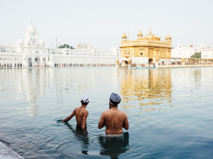 Men bathing at Harmandir Sahib (Golden Temple), Amritsar, Punjab, India