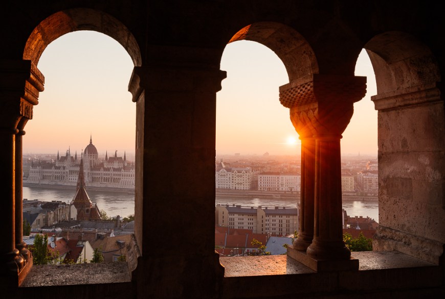 View from Fisherman's Bastion over Danube River & Hungarian Parliament Building at dawn, Budapest, Hungary