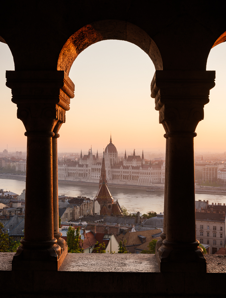View from Fisherman's Bastion over Danube River & Hungarian Parliament Building at dawn, Budapest, Hungary