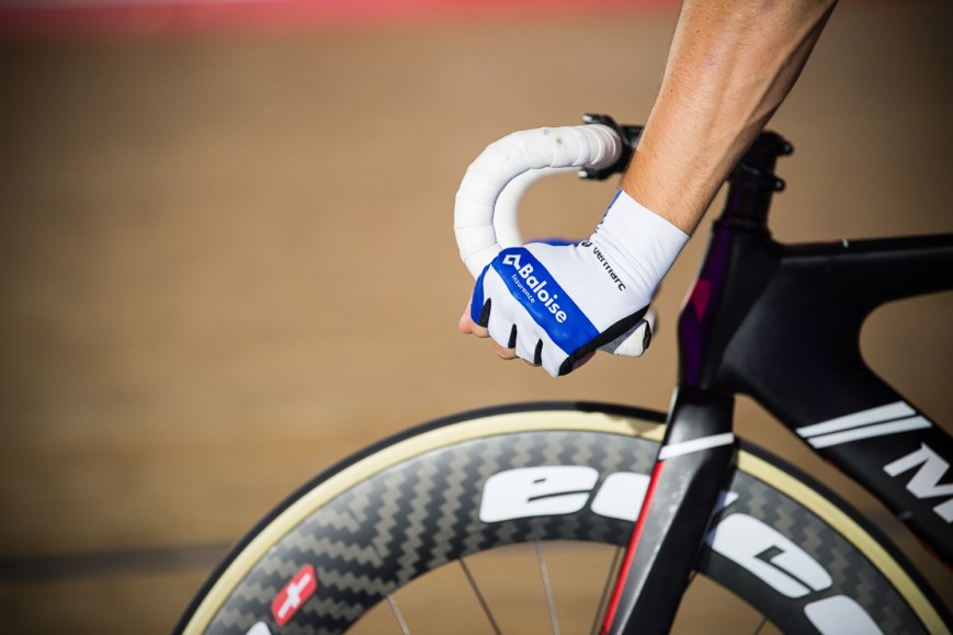 Detail of gloves on handlebars, Six Day Cycling at The Velodrome, London. October 2017 Nikon D4 with Nikon 70-200mm Lens at 190mm. Exposure: 1/125th at f/2.8 and ISO 1250