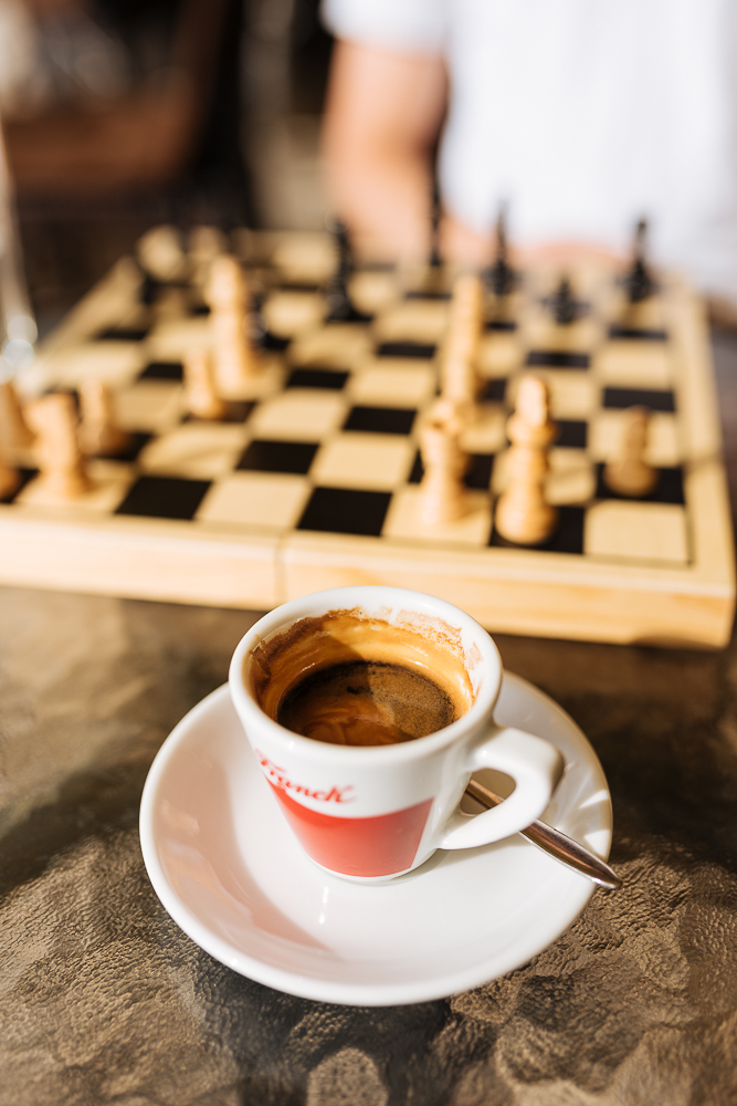 Espresso with chess set in background, Old Town, Sarajevo, Bosnia