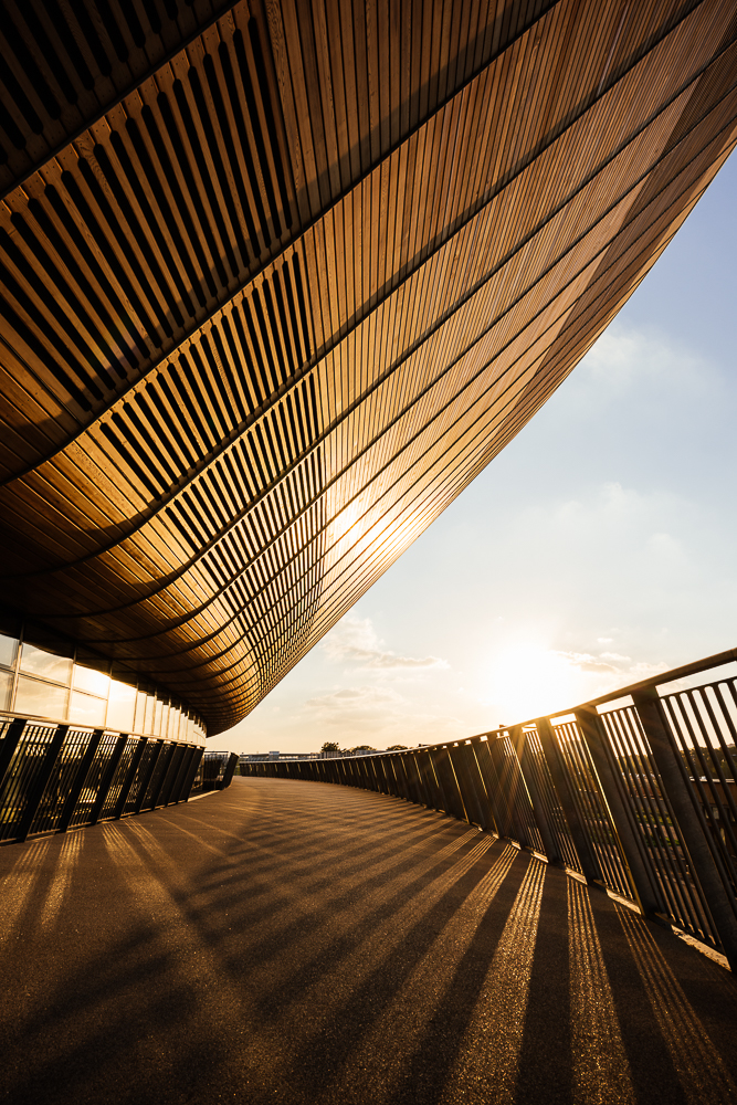 Evening light on exterior of The Velodrome, Queen Elizabeth Olympic Park, Stratford, London, UK