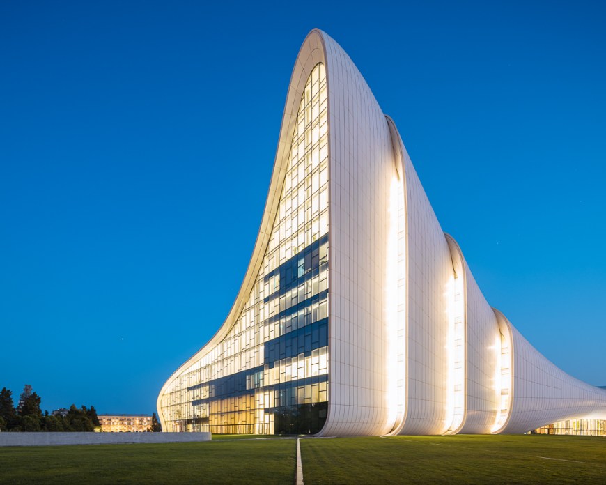 Exterior of Heydar Aliyev Building at night (designed by Zaha Hadid), Baku, Azerbaijan